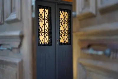 a close up of a black door in a house at The Courtyard Episkopi Guest Houses in Episkopi Lemesou