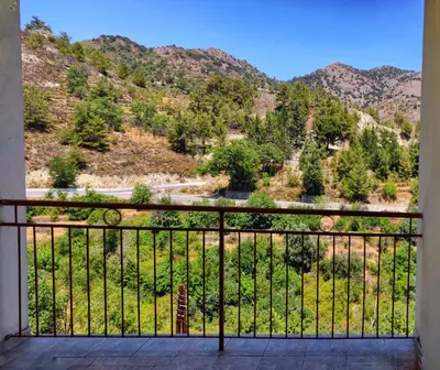 a balcony with a view of a mountain at Το Σπίτι του Προκόπη in Nicosia
