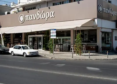 a white car parked in front of a building at Glabur Stays - The Amazing 1 BDR - Executive apt Nicosia Center Free Parking & WiFi in Nicosia