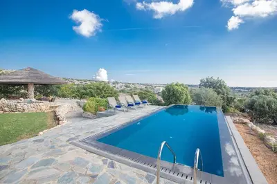 a swimming pool in a villa with a view at Villa Ayia Napa Foothills, Exquisite 5Bdr Ayia Napa Villa With Pool in Ayia Napa