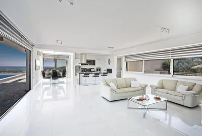 a white living room with two couches and a table at Villa Saranta Gold - Exquisite 3 Bedroom Protaras Villa With Private Pool in Protaras