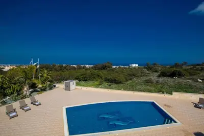 a swimming pool on top of a house at Villa Protaras Deluxe, Fabulous And Luxurious 7Bdr Villa, Close To Fig Tree in Protaras