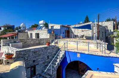 a view of a city with a blue building at Blue Oak House in Kato Drys
