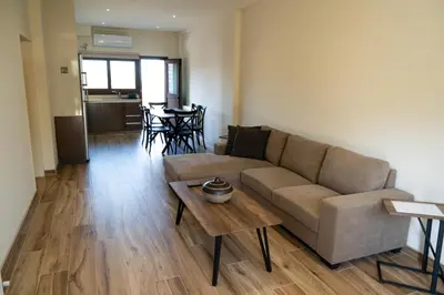 a living room with a couch and a table at Zangoulos Mountain in Kakopetria