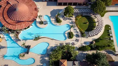 an overhead view of a pool at a resort at ROBINSON Cyprus in Alaminos