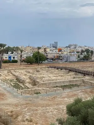 an amphitheater with a city in the background at Larnaca Comfort Rooms With Smart TV & Netflix in Larnaka