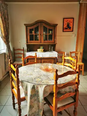 a dining room with a table and chairs at Moutoullas Mountain Views in Moutoullas