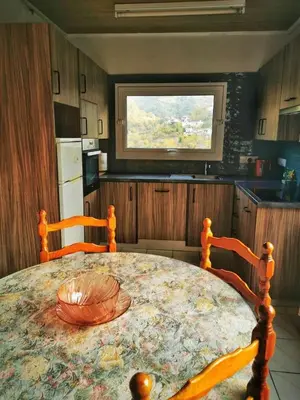 a kitchen with a table with a bowl on it at Moutoullas Mountain Views in Moutoullas