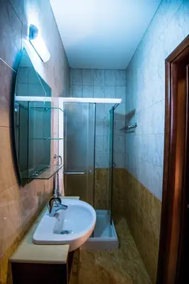 a bathroom with a sink and a shower at Luxury Villa Regina in Protaras