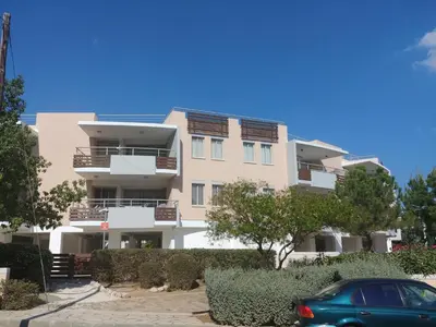 a building with a car parked in front of it at Amathousa Coastal Heights D202 in Limassol
