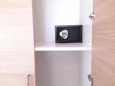 a small television sitting on a shelf in a door at NISSI BEACH Apt 7 BIG VERANDA AND FREE WIFI in Ayia Napa
