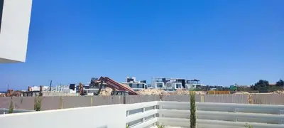 a view of the city from the roof of a building at Diamond villas in Protaras