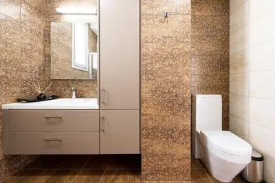 a bathroom with a toilet and a sink and a mirror at Villa Dione by Ruidoso Luxury in Ayia Napa