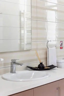 a bathroom sink with a plate on top of it at Villa Marsali by Ruidoso Luxury in Ayia Napa