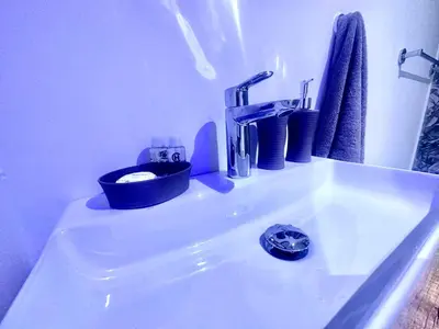 a sink with a faucet on top of it at Sun Plaza Suites - Adults Only in Ayia Napa