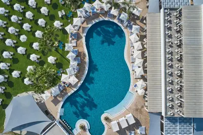 an overhead view of a swimming pool at a resort at Atlantica Sea Breeze, Adults Only in Protaras