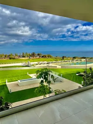a view from a window of a building with a park at Emerald Suites in Protaras