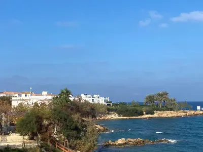 a view of a river with buildings and trees at Olive Tree Villa - Protaras in Protaras
