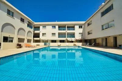 a swimming pool in front of a building at MyHome DeLux, Ayia Napa 3 Bedroom with Pool in Ayia Napa