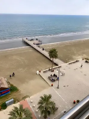 an aerial view of a pier on the beach at Larnaca Room, 50m to the Finikoudes beach in Larnaka