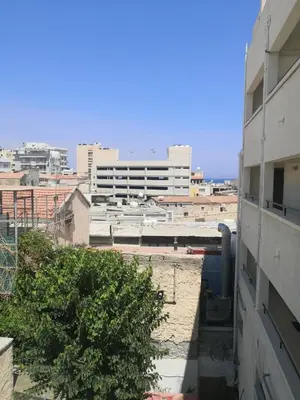 a view of a city from a building at St Lazaros, Larnaca Center Studio in Scala