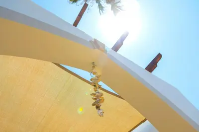 a chain hanging from the underside of a beach umbrella at Protaras Villa Elena 3 in Protaras