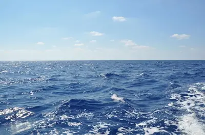 a view of the ocean from the back of a boat at Central Large Apt Next to the Beach in Larnaka