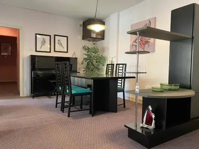 a kitchen with a table and chairs in a room at private room in a shared flat at best location in Limassol