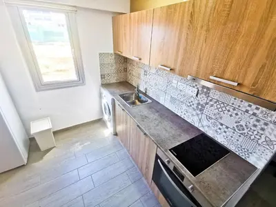 a kitchen with a sink and a counter top at Hidden Gem City Studio in Larnaka