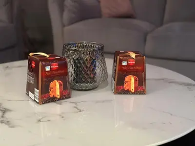 three boxes and a vase on a table at StayCity Flat!!! in Nicosia