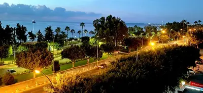 a city street at night with street lights at Ariadne 1, Sea Side Boutique Apartment in Limassol