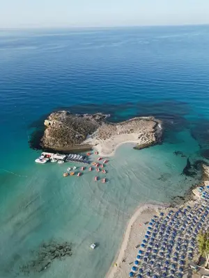 an aerial view of a small island in the ocean at NISSI BEACH AYIA NAPA Pool View Apartment Large Terrace 450m from Nissi Beach in Ayia Napa