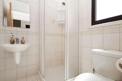 a bathroom with a toilet and a sink at Villa Greko in Protaras