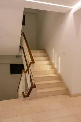 a staircase in a building with a stair case at City Centre Studio Apartments Nicosia in Nicosia