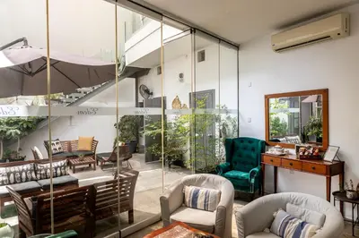 a living room with chairs and a table at Edem Traditional House in Larnaka