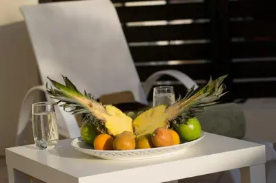 a bowl of fruit on top of a table at Protaras Allium Villa in Protaras