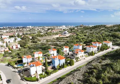 an aerial view of a city with the ocean at Villa Royal View in Protaras