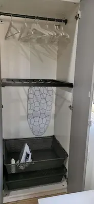 an empty refrigerator with its door open in a kitchen at Pretty and quiet studio, with wifi and parking in Limassol