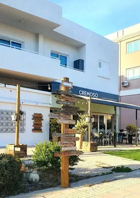 a street sign in front of a building at KALIDONIA RESIDENCE Suite Nicosia , Spacious 2 BR suite with office in Nicosia