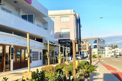 a city street with a building and a street sign at KALIDONIA RESIDENCE Suite Nicosia , Spacious 2 BR suite with office in Nicosia