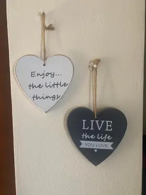 two hearts hanging on a wall with the words live the life you love at Nissi3 B1 Lovely 1Bdr Ground Floor Apartment near Nissi Beach. in Ayia Napa
