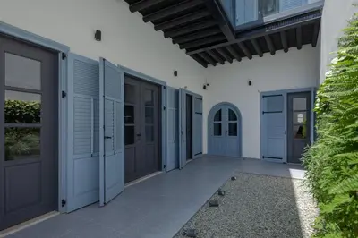 a hallway of a house with doors and a courtyard at The Sendal Boutique Hotel in Nicosia