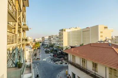 an overhead view of a city street with buildings at Fanta Sea Apartment in Larnaka