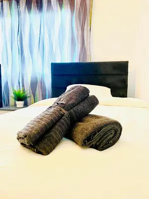 three pillows sitting on top of a bed at Lina 703 in Larnaka