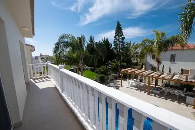 a balcony with a view of a resort at Villa Helena in Ayia Napa