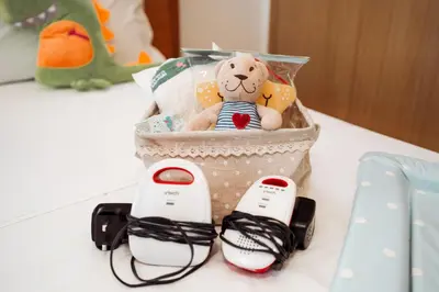 a basket with a stuffed animal and two remote controls at Villa Hanna in Protaras