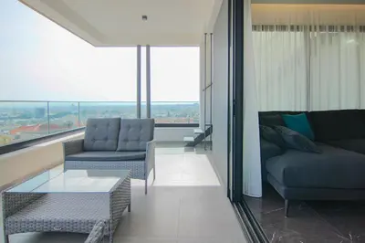 a living room with a couch and chairs and a table at Phaedrus Living: Sea View Anna Residence 302 in Limassol