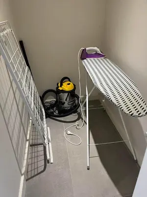 a room with a rack with a helmet on it at Central Business Suites Nicosia - Araouzou By Platform 357 in Nicosia