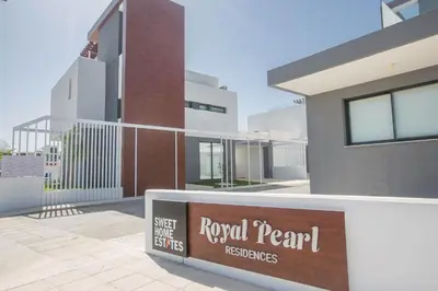 a building with a sign in front of it at Anassa Seaview Villa - Stunning Panoramic Views in Protaras