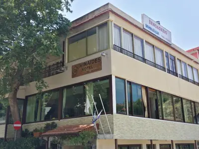 a building with a sign that reads windsor hotel at Minaides Hotel in Kakopetria
